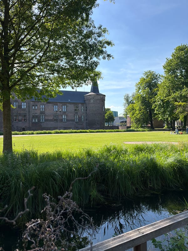 Woman photographed near historic castle in Helmond, Netherlands