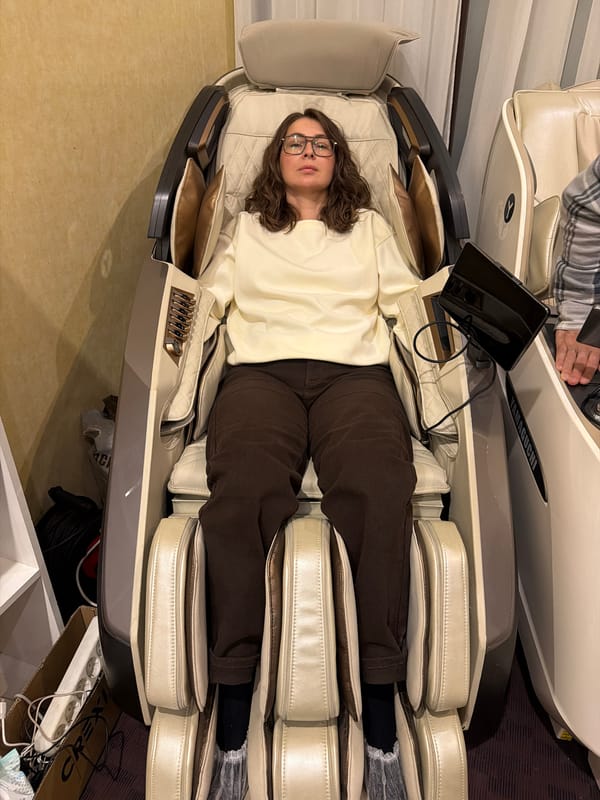 Woman uses massage chair in Izhevsk, Russia