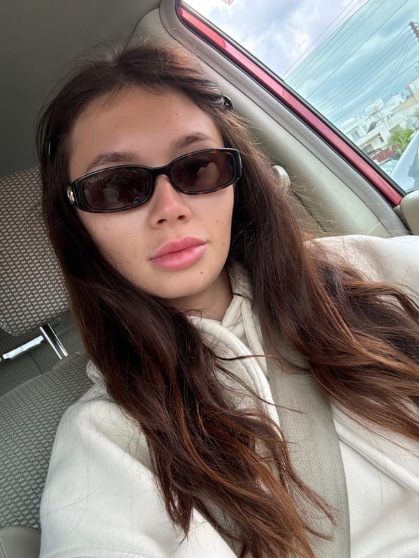 Young woman photographed in car in Larnaca, Cyprus