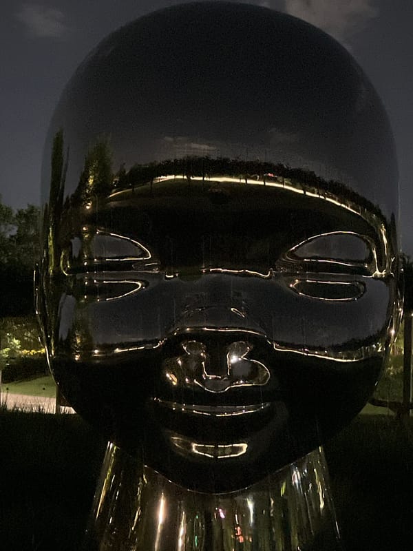 Evening stroll through Krasnodar Park's sculptures and lit walkways