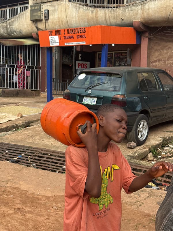 Everyday street life moving through Onitsha, Nigeria