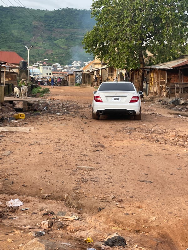 Everyday life in a low-income Lokoja neighborhood after rain