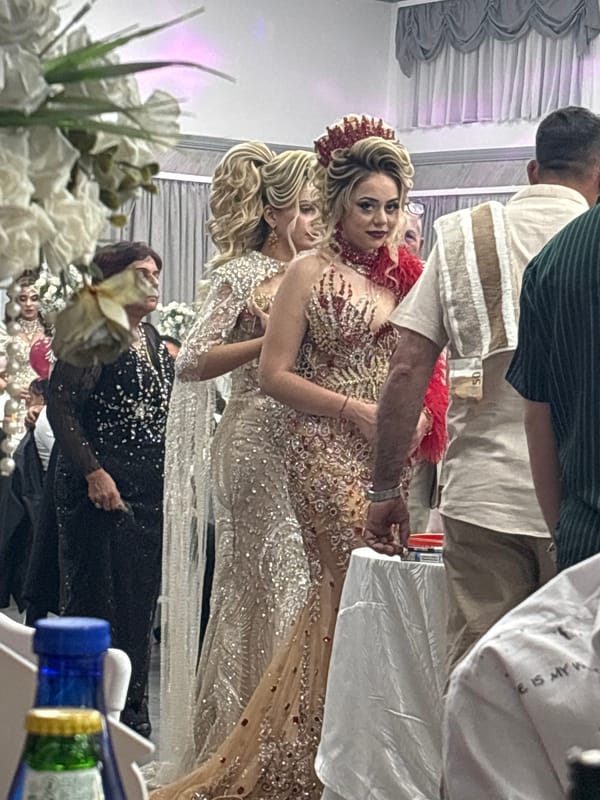 Formal celebration with elaborate gowns held in Banya hall