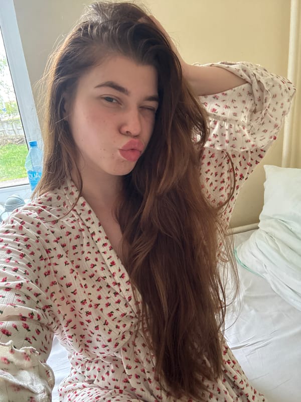 Woman photographed in bedroom setting in Ramenskoye, Russia