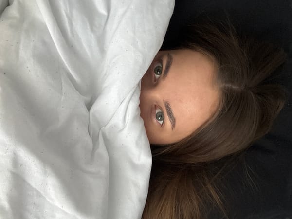 Woman and tabby cat share morning moments in Russia