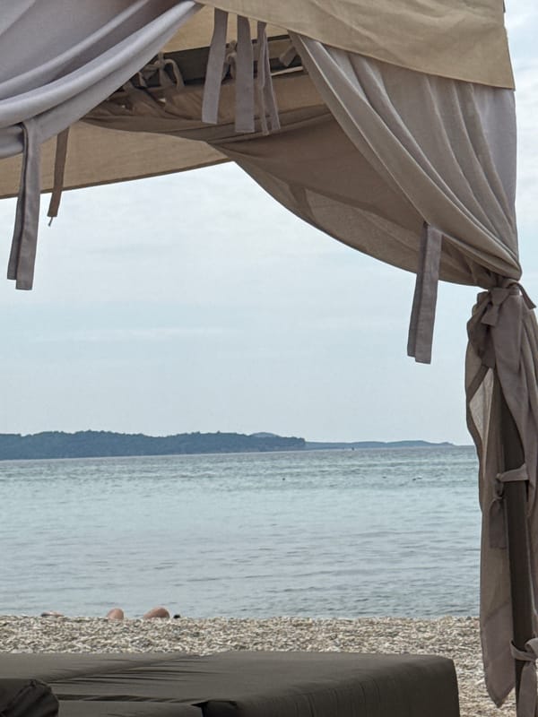 Lazy morning at a pebble beach resort in Limenaria, Greece