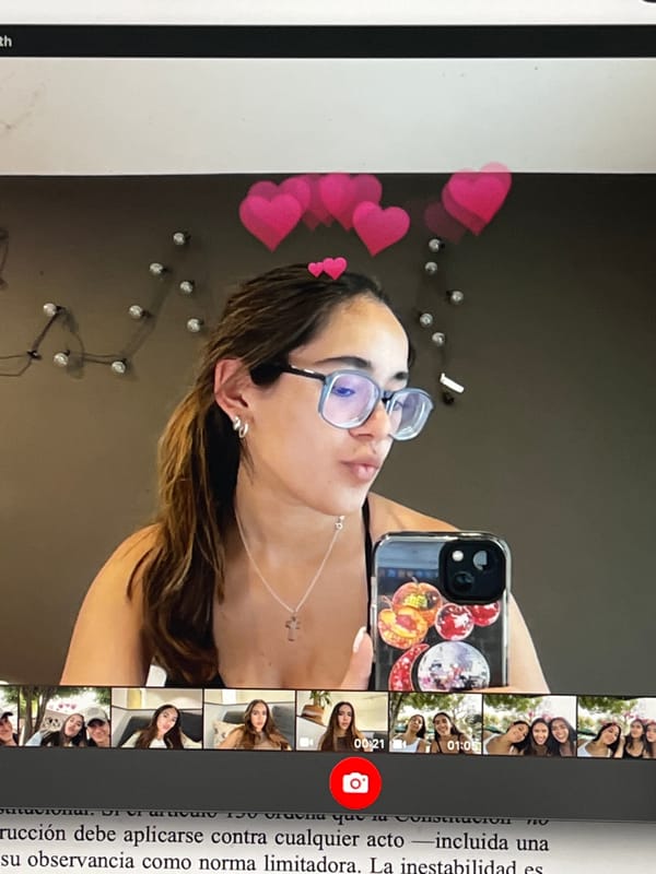 Woman takes selfies while studying constitutional work in Mexico