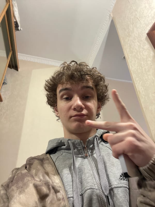 Young man takes indoor selfies in Krasnoyarsk
