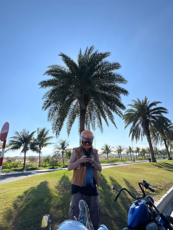Motorcyclists gather for roadside break during Cam Ranh rally