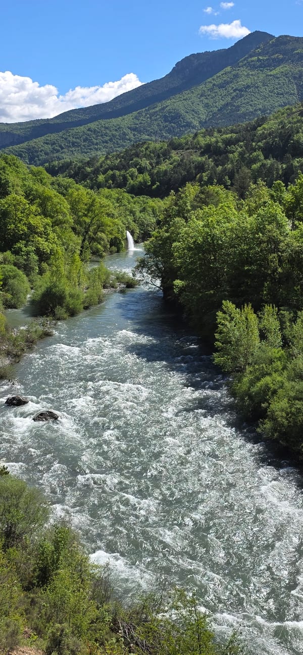 Turbulent river waters documented flowing through Seira, Spain