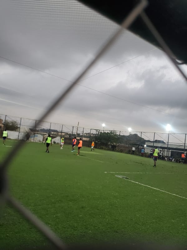 Soccer game underway in Gura Top, Nigeria