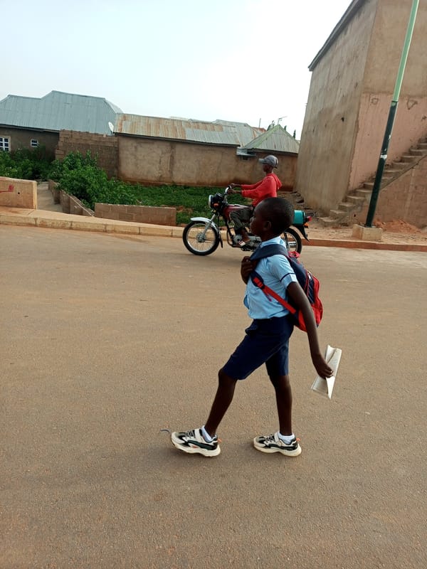 Morning foot traffic on the streets of Tempure and Garko, Nigeria