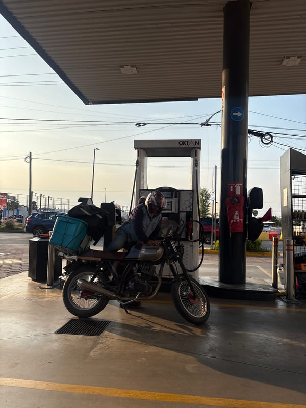 Motorcycle refueling documented at Mexican gas station
