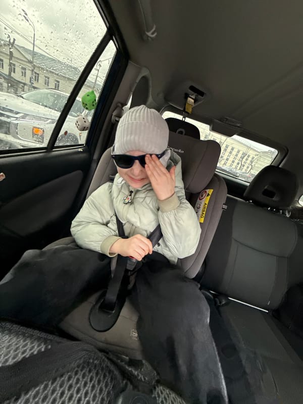 Child in car seat, hiking boots captured in Perm