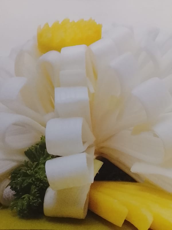 Elaborate fruit and vegetable carving demonstration showcases culinary artistry