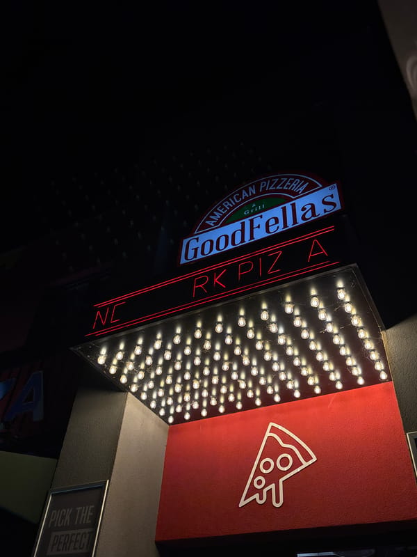 Goodfellas pizzeria displays illuminated signs in Podgorica, Montenegro
