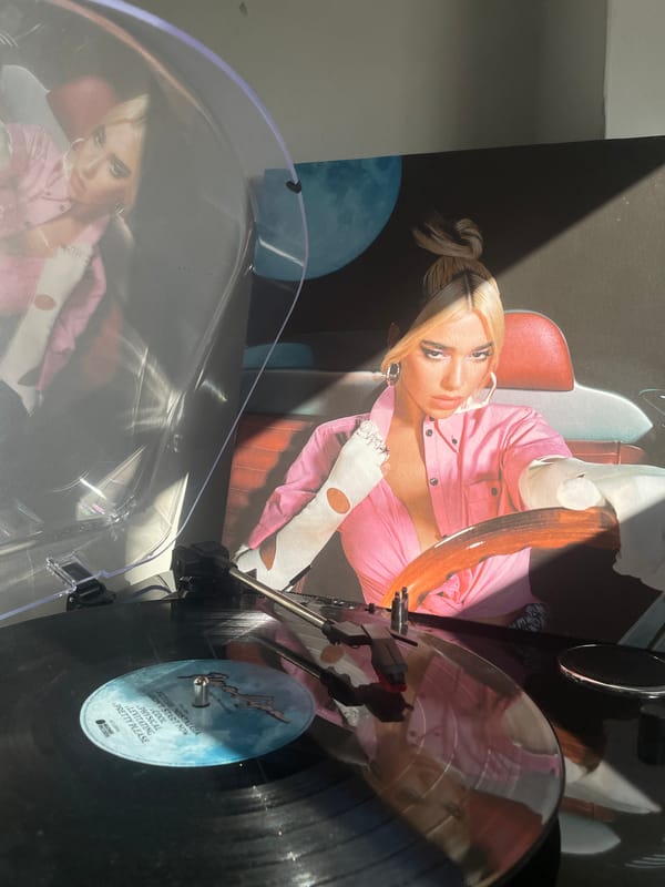 Dua Lipa vinyl spins on turntable during morning listening session
