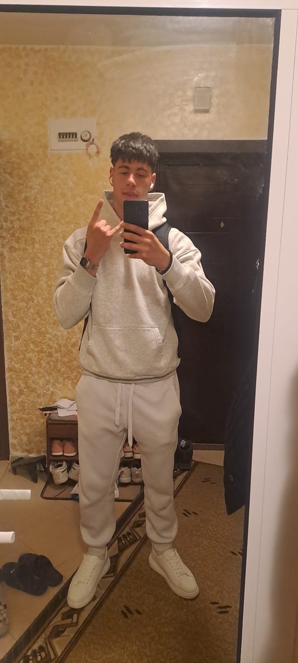 Young man takes mirror selfie in Burgas, Bulgaria