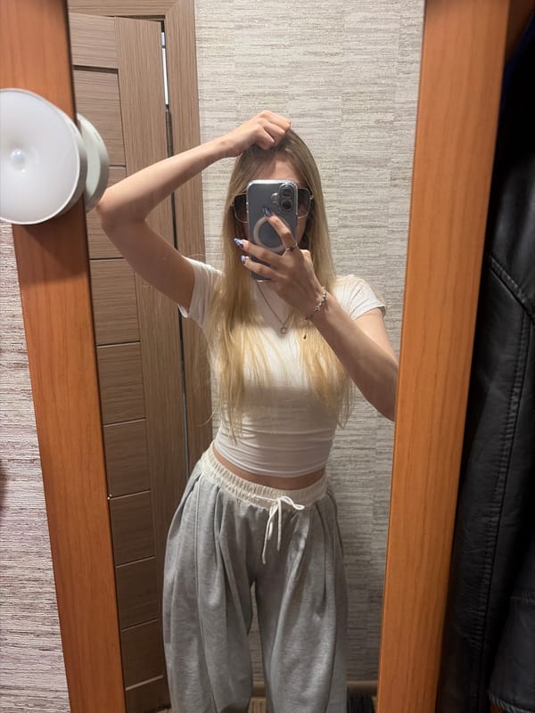 Mirror selfie and outdoor shot, same outfit, one minute apart