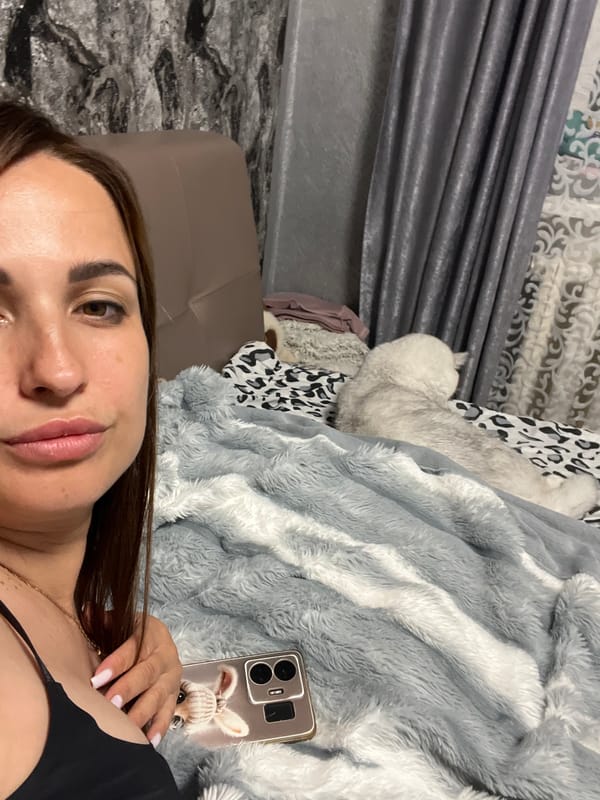 Lazy afternoon at home: selfies and cats on the bed