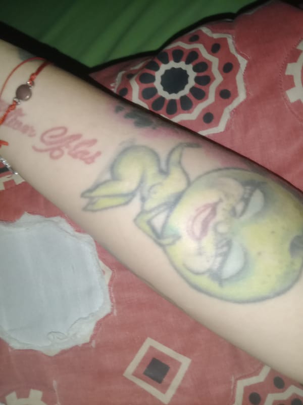 Intimate bedroom photos document tattoos and personal moments