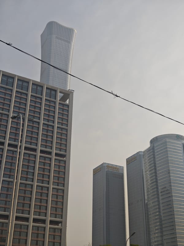 Beijing resident documents skyline views, robotic floor cleaner