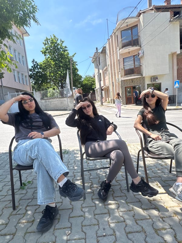 Young people gather for casual street meetup displaying tattoos
