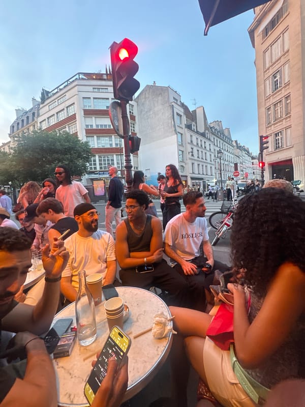 Evening gathering at a classic Paris café terrace